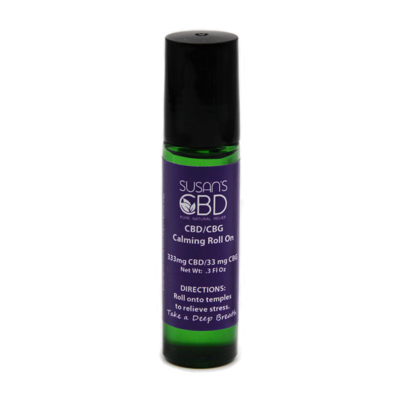 CBD/CBG calming roll on bottle with black cap and purple label on a white background